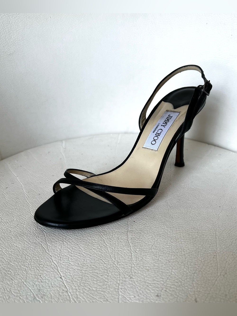 ( X ● __ ● X )
Jimmy Choo Black Strappy Sandals Heels